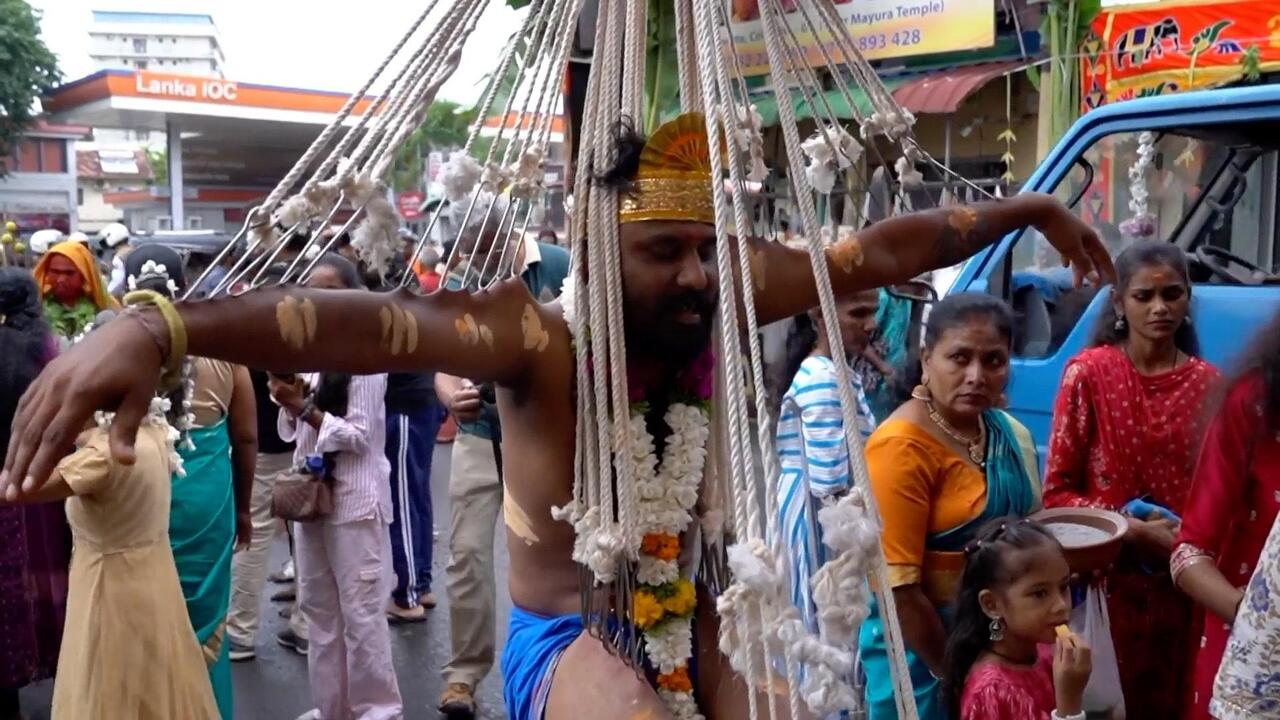 Hooked on faith! Sri Lankan Hindus withstand extreme piercings to honour war deity
