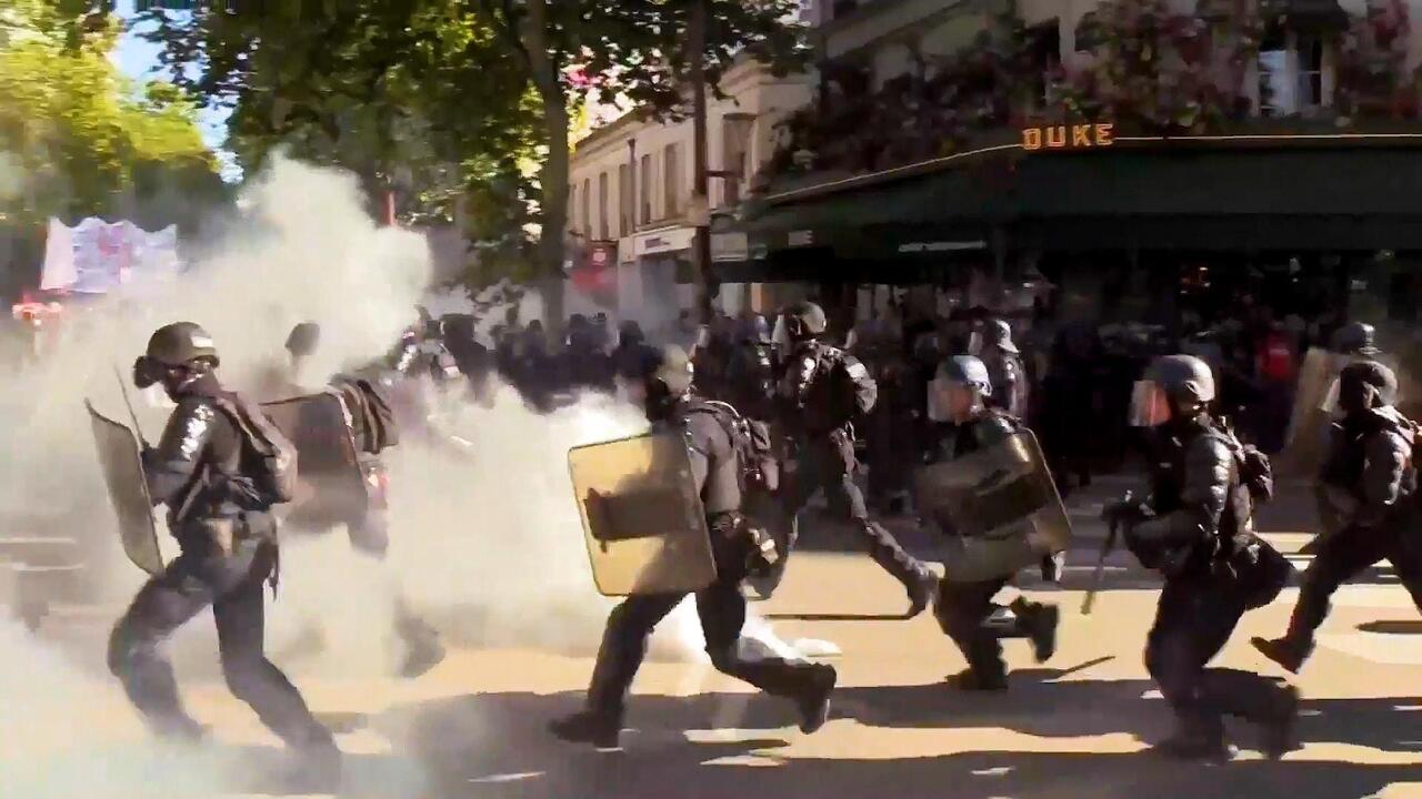 France in turmoil - Riot Police storm Paris amid nationwide unrest 
