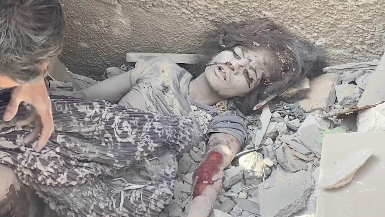 Pregnant woman pulled from rubble as strikes pound Gaza's Al-Rimal district