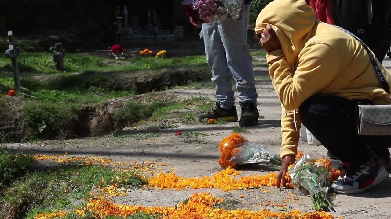 Mexicans visit mass graves to remember the unidentified on Day of the Dead