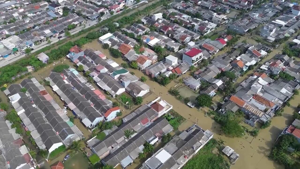 Streets, houses submerged as severe flooding hits Indonesia's West Java