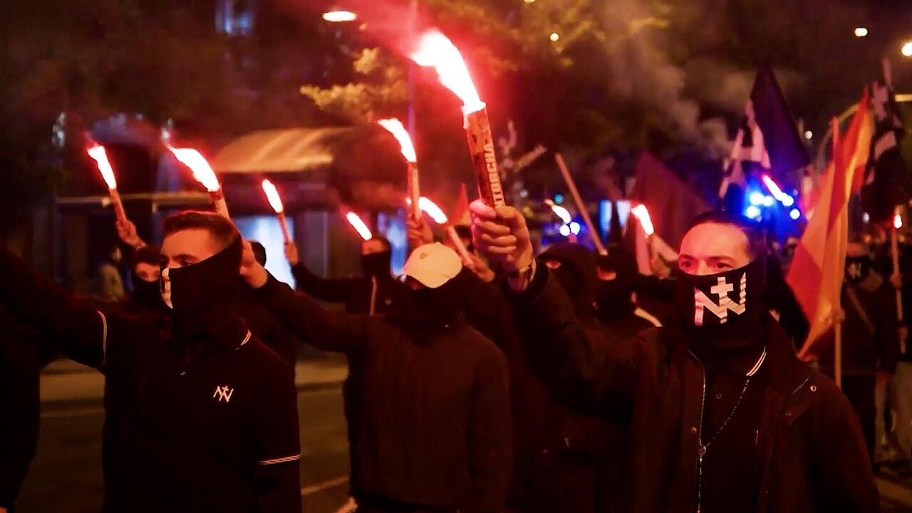 Flares and fury! Chaos in Madrid as police confront nationalist rally
