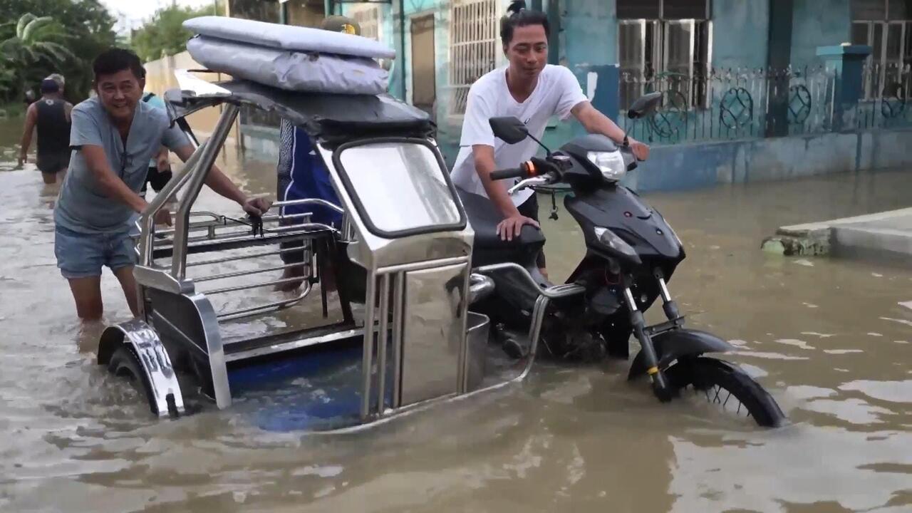 After the storm - Floods paralyse Philippines as Super Typhoon Fung-wong sweeps through

