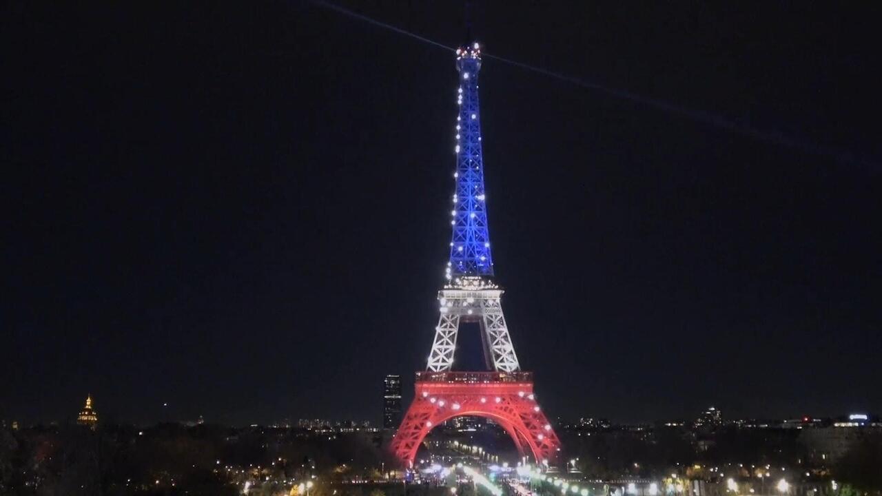 Tricolor tribute - Eiffel Tower lights up to honour victims of 2015 Paris attacks


