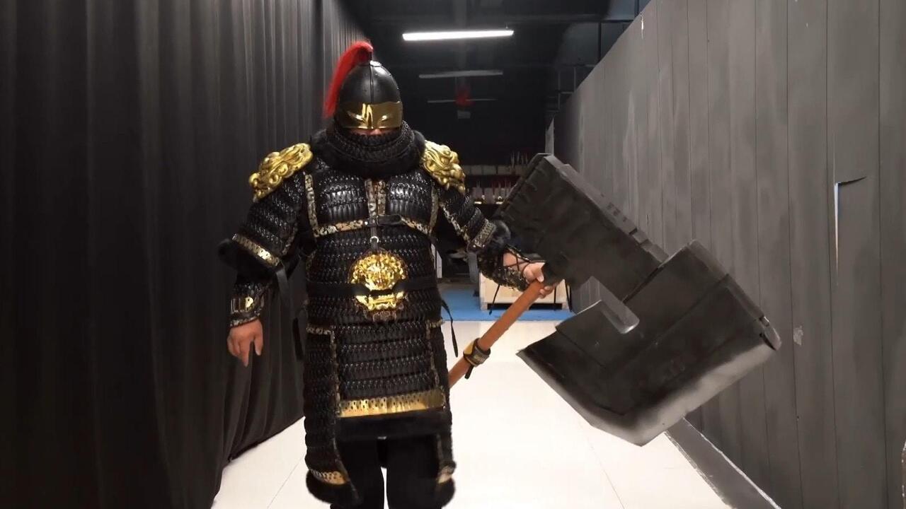 Pumping some serious iron- Powerlifter Xu Mingjie works out in ancient Chinese armour