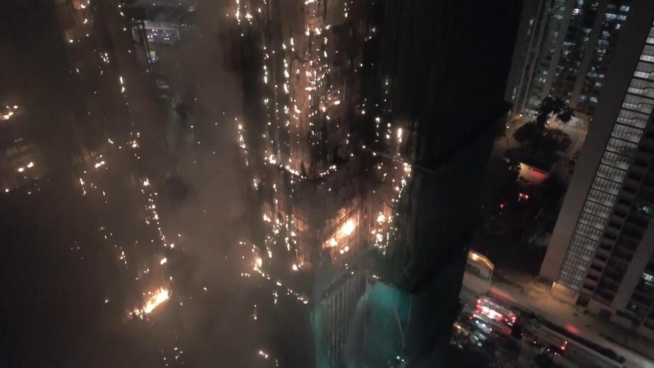 Blaze from above - Sweeping drone shots as deadly fire rips through apartment blocks

