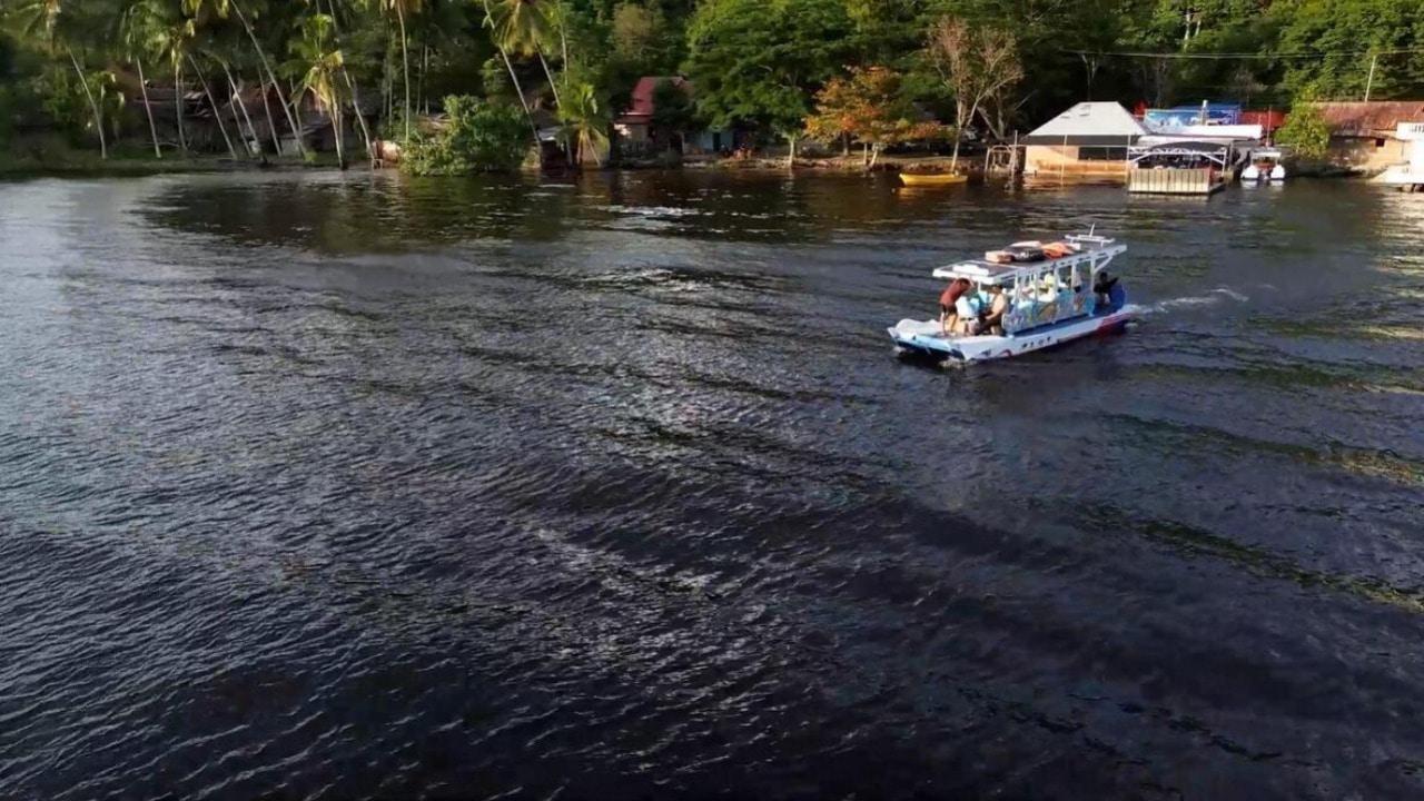 Hope by boat-Aid reaches isolated village after floods, landslides kill 800+ in Indonesia
