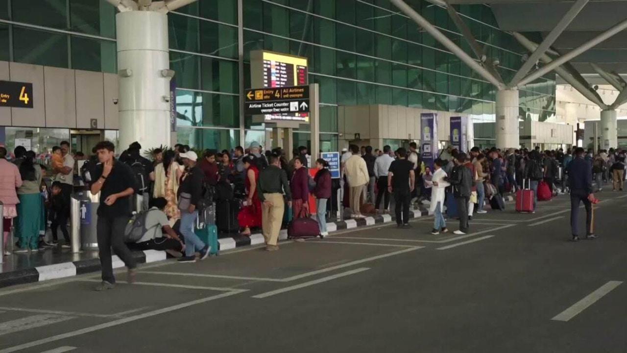 Travel chaos - Passengers stranded at New Delhi airport after over 500 flights cancelled