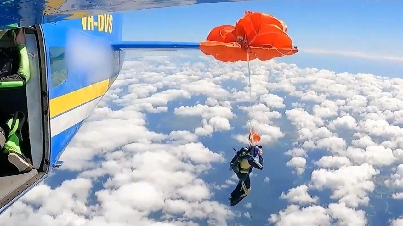 Chute happens! - Skydiver CAUGHT on plane's wing
