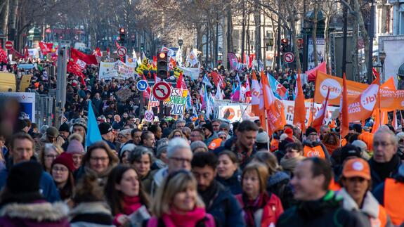 Teachers and transport workers strike in Paris over budget cuts