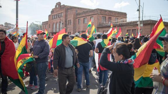 Bolivians in La Paz celebrate following preliminary presidential election results