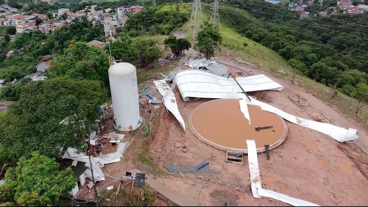 Washed away - Water tank rupture leaves one dead and damages several ...