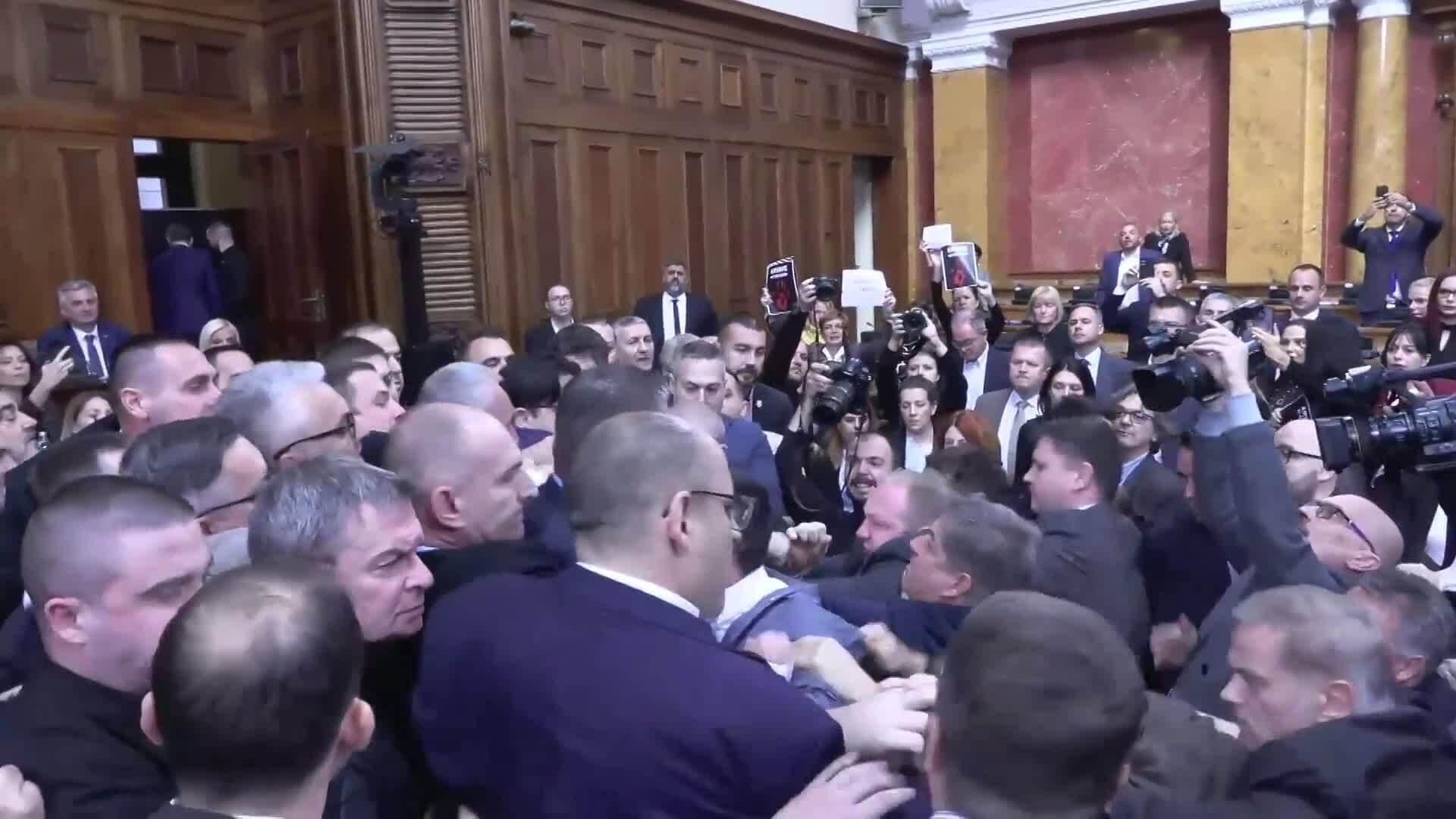 Parliament punch-up! Serbian lawmakers brawl after opposition protest ...