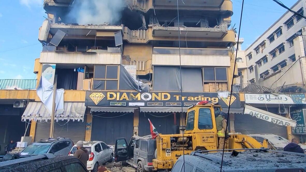 Suburb strike - Residential building in ruins after Israeli shelling in ...