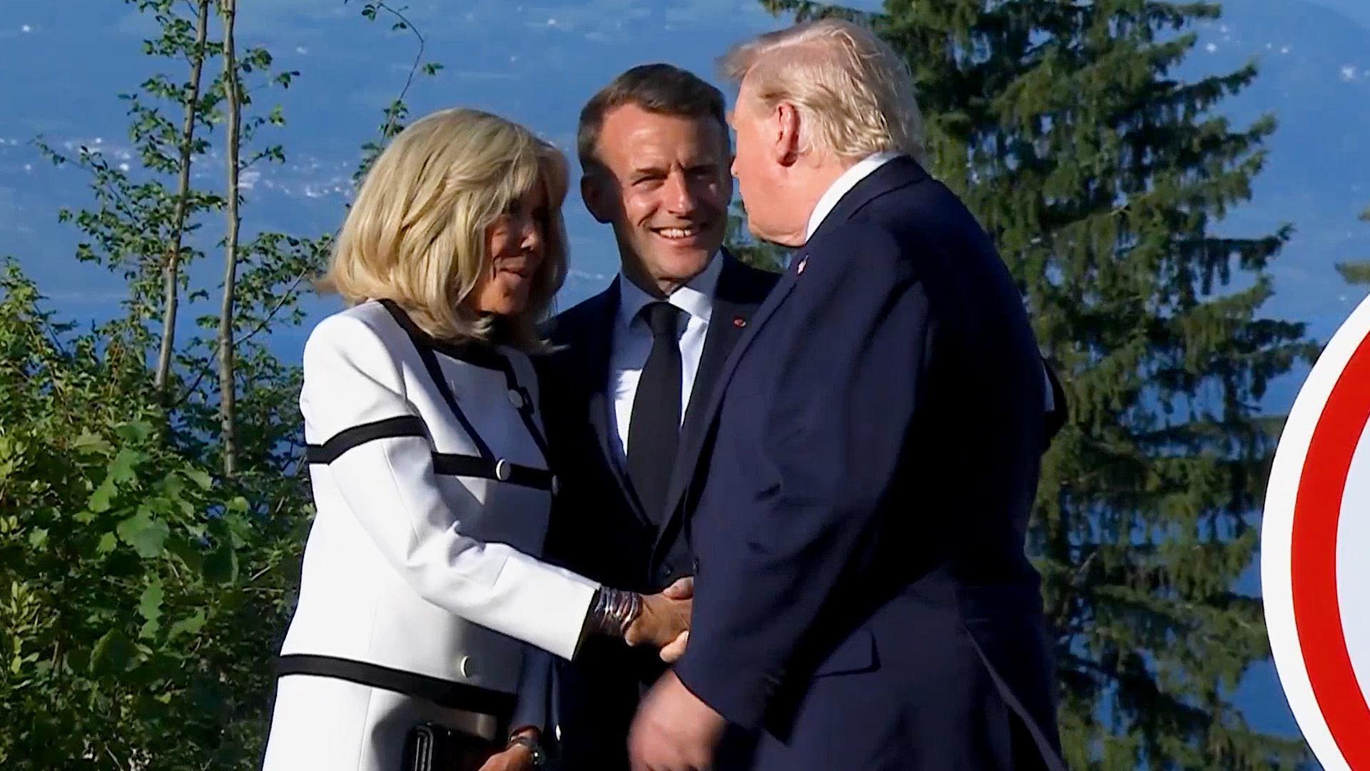 The long hello! - Trump shakes Brigitte's hand for TOO long at G7 ...