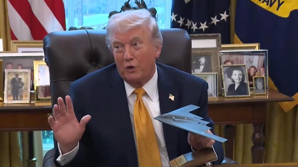 Boys and their toys! - Trump plays with B-2 bomber model, says 'let me ...
