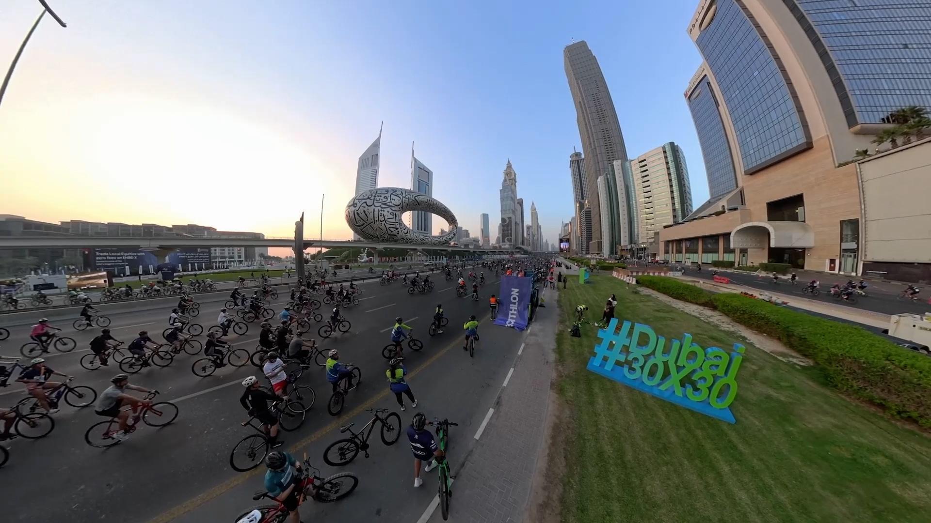 Wheelie good morning! Cyclists hit Sheikh Zayed Road at dawn as Dubai ...