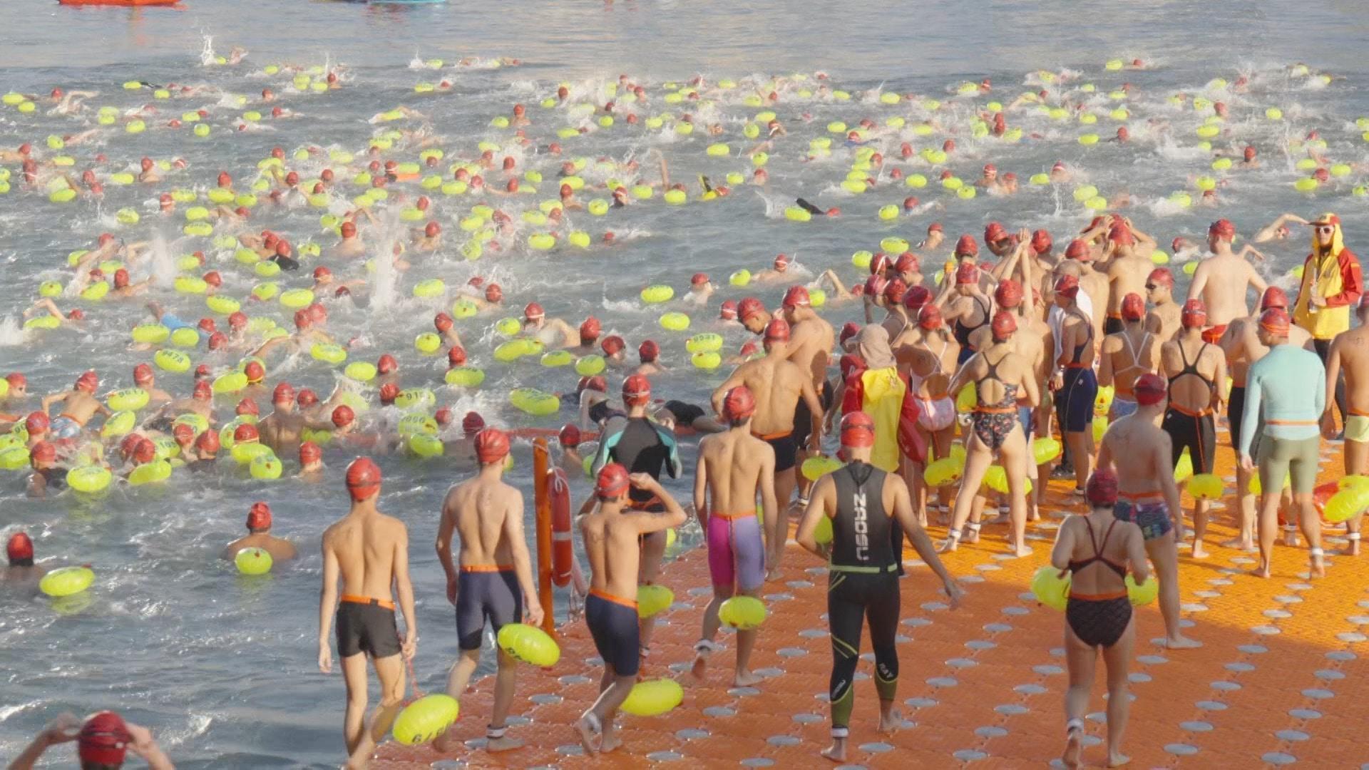 Swim-sational competition! - Thousands brave waves as Hong Kong's ...