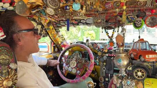 Enjoy the ride! Tehran taxi driver transforms his cab into Aladdin's cave