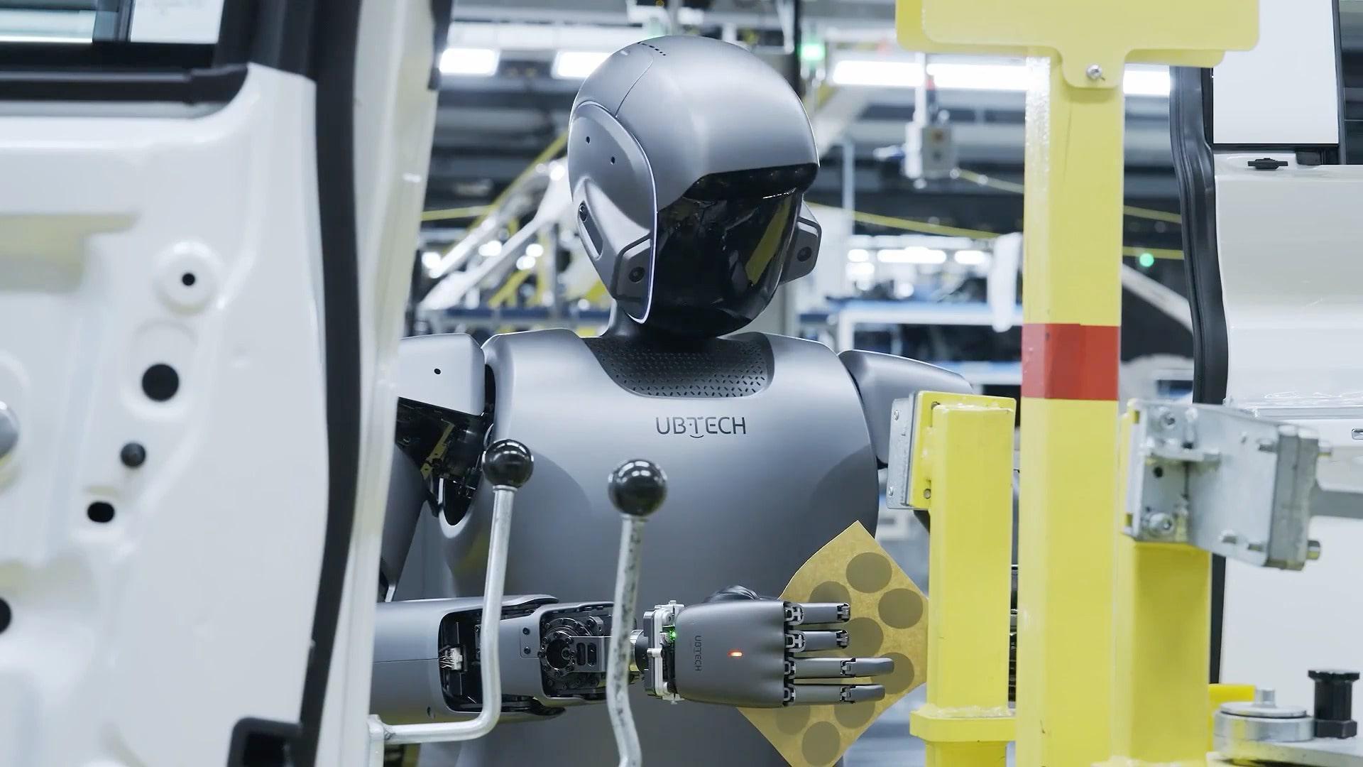 Robot walkers turn workers! Chinese humanoids train at automobile ...
